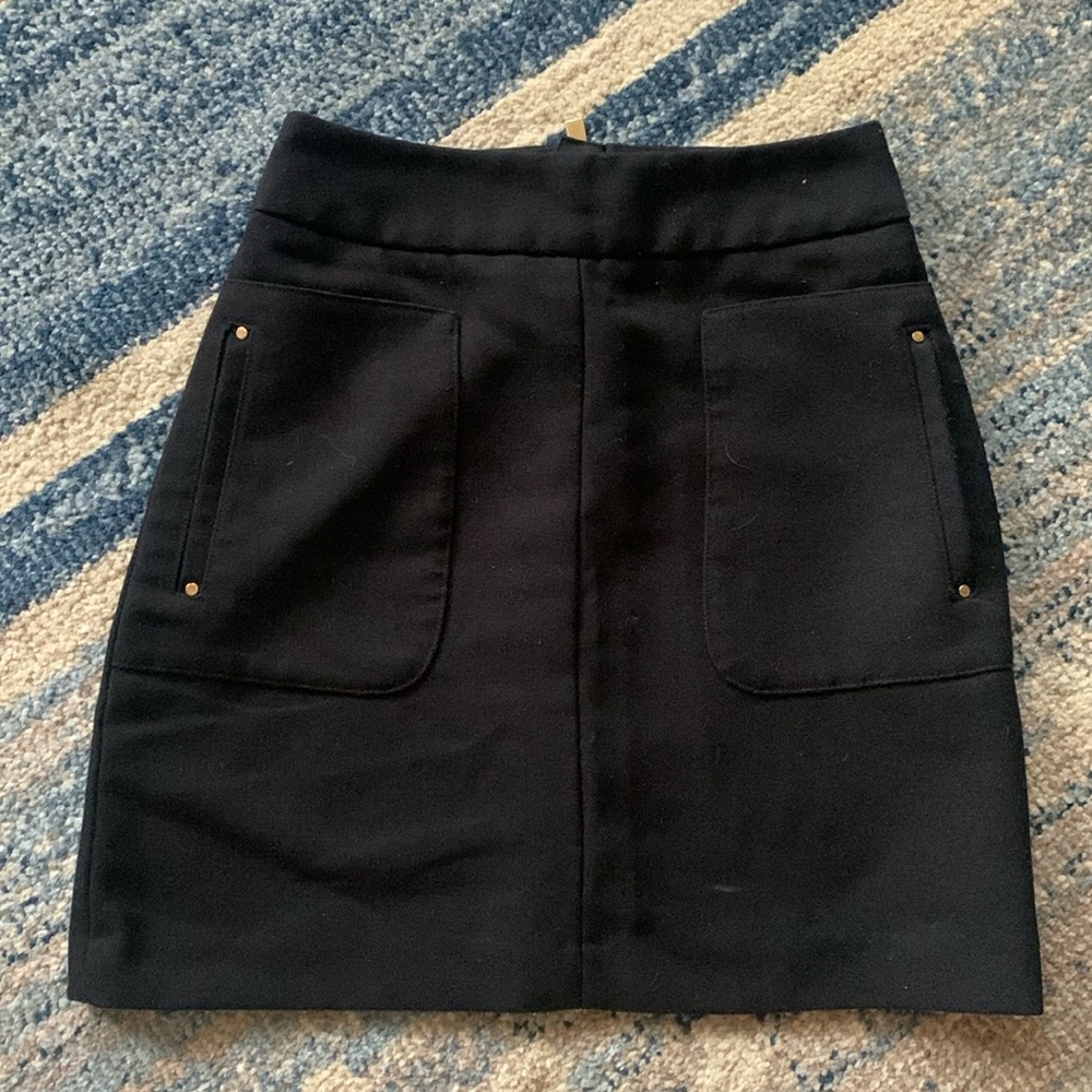 H&M black mini skirt with pockets and gold zipper